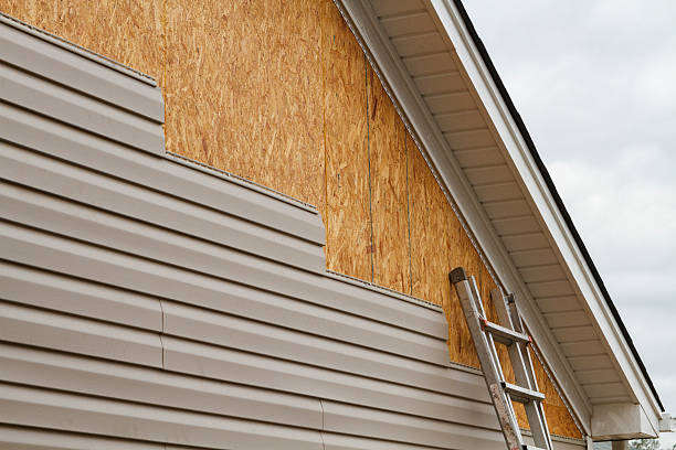 Professional Siding Installation technician working in Springfield, PA